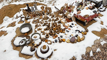 Souvenirs covered with snow surrounded by valley in Cappadocia, Turkey 