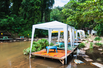 small teepee tent outdoor for enjoy natural outside in forest © yupachingping