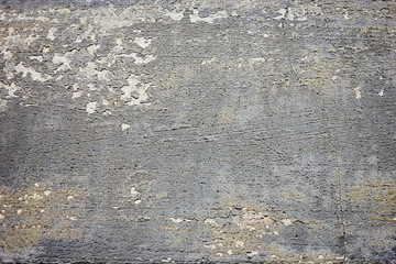 texture of an old gray concrete wall close-up in spots and scratches