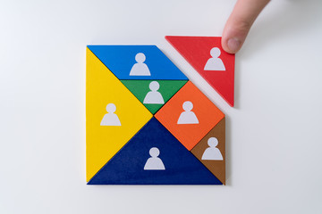 Businessman Building Tangram Square Block