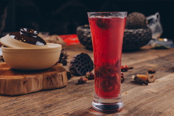 Luo han guo, red dates, black tea, In a clear glass.In ancient China, it had the function of kee