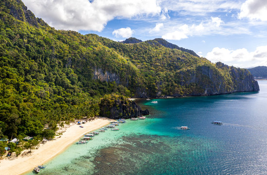 Top view of beautiful turquoise beach, with white sand. Best beaches of Philippines. Seven Commandos beach, Palawan