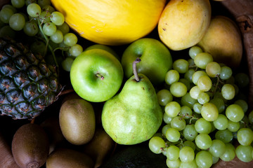 Pineapple, apple, pear, grapes, melon and Avocado