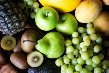 Pineapple, apple, pear, grapes, melon and Avocado