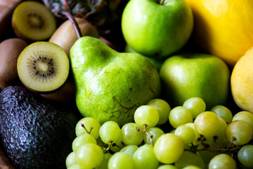 Pineapple, apple, pear, grapes, melon and Avocado