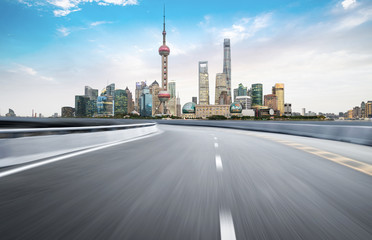 Dynamic blurry highway and city skyline in Shanghai, China