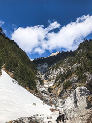 natural beautiful mountains view, hiking in mountains, clouds and forest