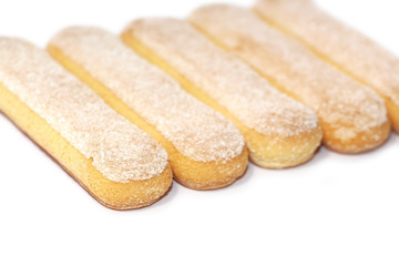 Fototapeta na wymiar Biscuit cookies Lady's fingers. Bakery products. Savoiardi. Tiramisu. Dessert. Sugar dough.
