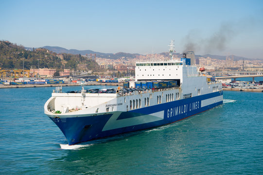 Barcelona, Spain - March 30, 2016: ferry ship Grimaldi Lines in sea. Ferry trip. Travelling by sea on ferry ship. Water transport of ferry ship. Summer vacation. Wanderlust and discovery on ship