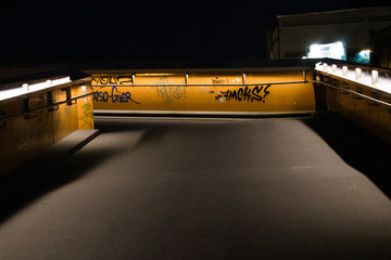 pedestrian overpass walkway with graffitis