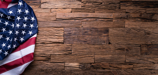 American Flag On Wooden Background