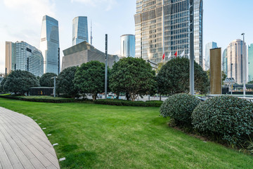 Lawn and office building in Lujiazui financial center, Shanghai, China