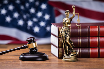 Gavel Near Books With Golden Scale