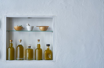 fresh harvest newolive oil hous home design wall shelf oils three bottles shelf food cooking mediterranean natuorganic toscany beauty country house healthy stylish white copy space kitchen barn greece
