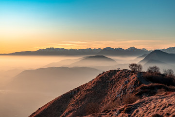 Obraz premium Winter sunset from an alpine peak of Friuli-Venezia Giulia
