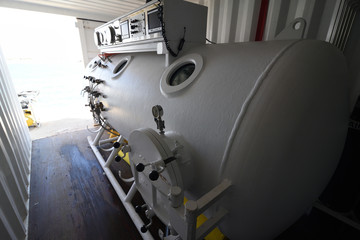 offshore commercial diving system and diver with a helmet