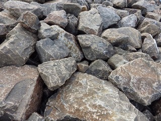 Fototapeta na wymiar close up stone rock for coastal protection.different size