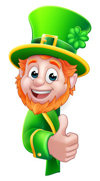 A St Patricks Day Leprechaun cartoon character peeking around a sign and giving a thumbs up