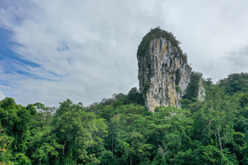 Aerial view of legendary Batu Punggul Pinnacle located at the middle of the virgin jungle Borneo Rainforest in Sapulut, Nabawan, Sabah.