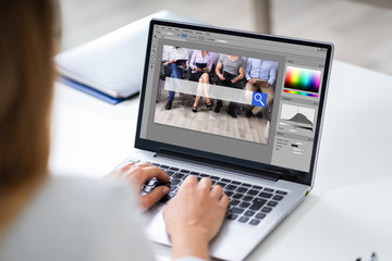 Designer Editing Photo On Computer
