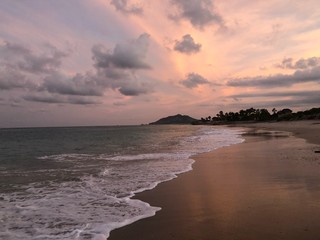 Romantic evening walk watching the sunset in exotic and wild Cabo Pulmo beach