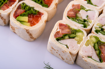  pita roll cut as a roll on a white background16 