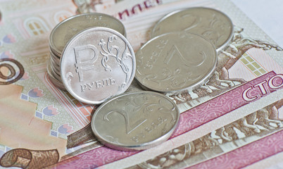 Money. Russian rubles coins and 100  rubles bills