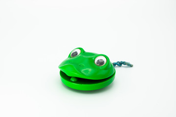 Castanets for children in shape of a green frog