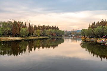 Lake and reflection in cloudy sky park