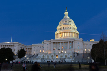 Washington DC Capitol golden light with blue sky background