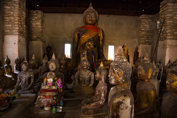 Fototapeta premium Thailand, Samui island “Secret Hall of Buddhas”, a small “chapel” containing countless small statues Doors of the Hall are locked, only a monk can open the doors.