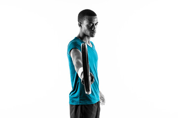 Fototapeta premium Afro American tennis player man over isolated white background .