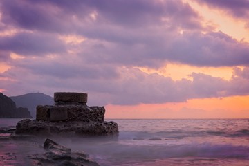 Sunrise, sunset on a breakwater in the Islote del Moro, Almeria, Andalusia, Spain.