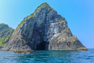 rock mountain on the sea