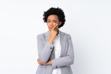 African american business woman over isolated white background thinking an idea
