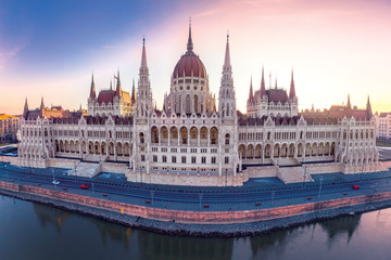 Fototapeta na wymiar Hungarian Parliament Building on the bank of the river Danube in Budapest at night, aerial photo