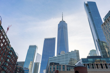 Naklejka premium Lower Manhattan Skyline with Modern Glass Skyscrapers