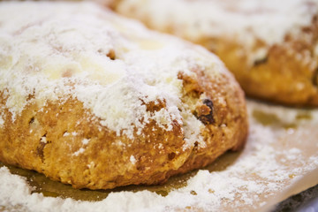 Traditional Christmas Stollen dusted with sugar