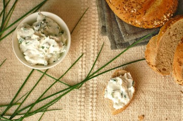 Slices of bread with chives spread