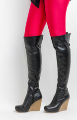 Stylish woman wearing overknee boots