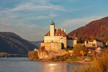 Fototapeta na wymiar Small castle Schonbuhel above the Danube in the romantic sunset, Austria