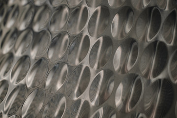 Obraz premium Metallic inox surface with circles pattern background