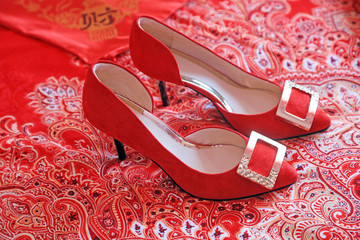 Red high heels on the carpet