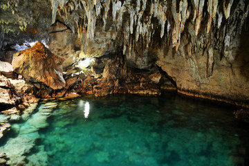 cave with underground lake on a tropical island in the philippines