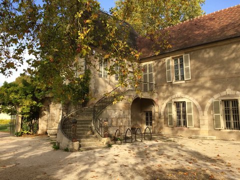 Autumn in the 19th century Arquebuse botanical garden and arboretum in Dijon, France. Located within a larger park and garden , it has  a Natural History Museum and a centuries old cypress.