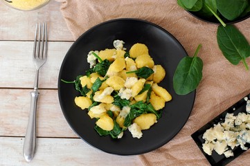 Sweet corn polenta gnocchi wiht spinach and cheese