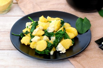 Sweet corn polenta gnocchi wiht spinach and cheese
