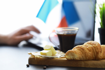 Fresh pastries on the table. French flavored croissant.