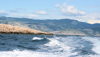 boating between Mala Luka bay and Baska, island Krk, Croatia