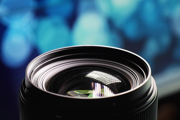 Equipment videographer and photographer. Lenses on the table against the background of bright...